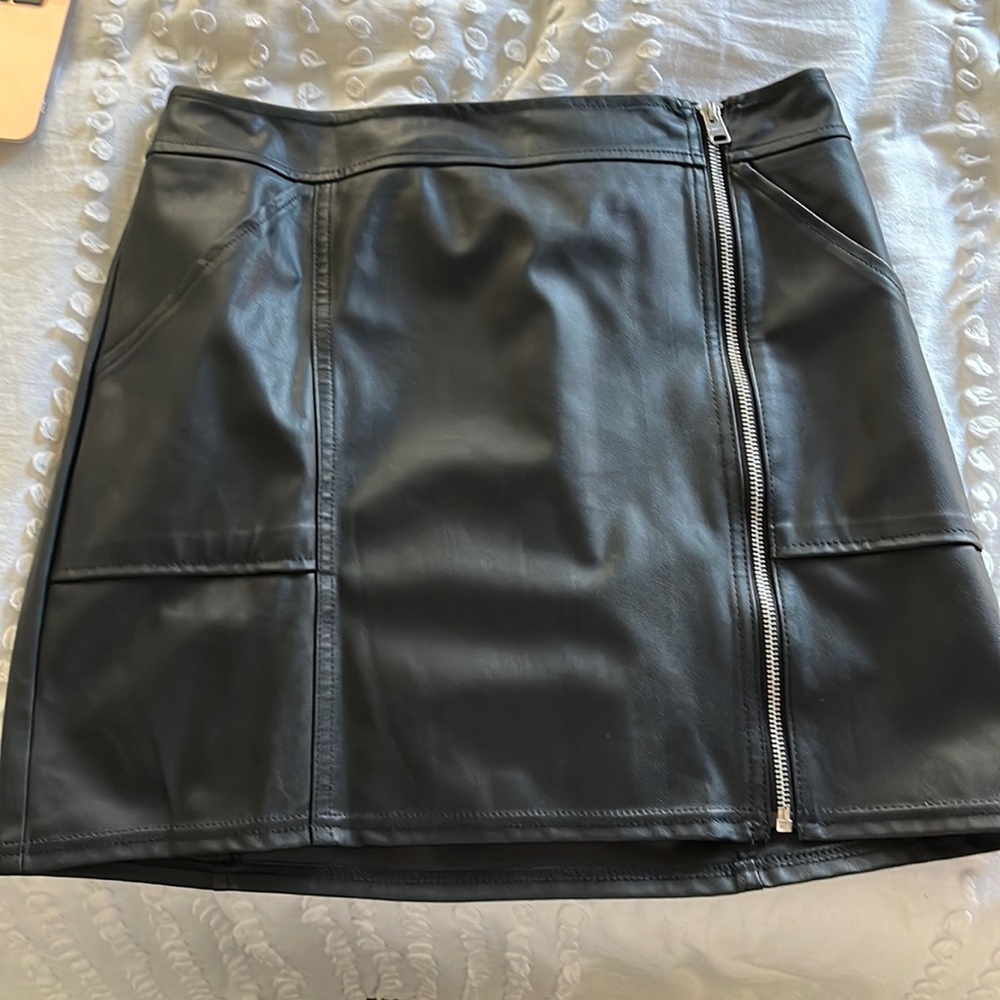 Express, size 8, black, zipper in the front, two front pockets, worn once